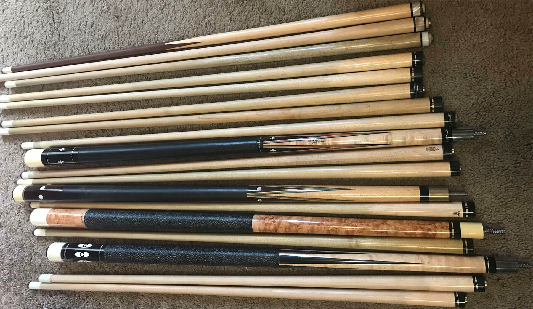 antique pool cues with ivory