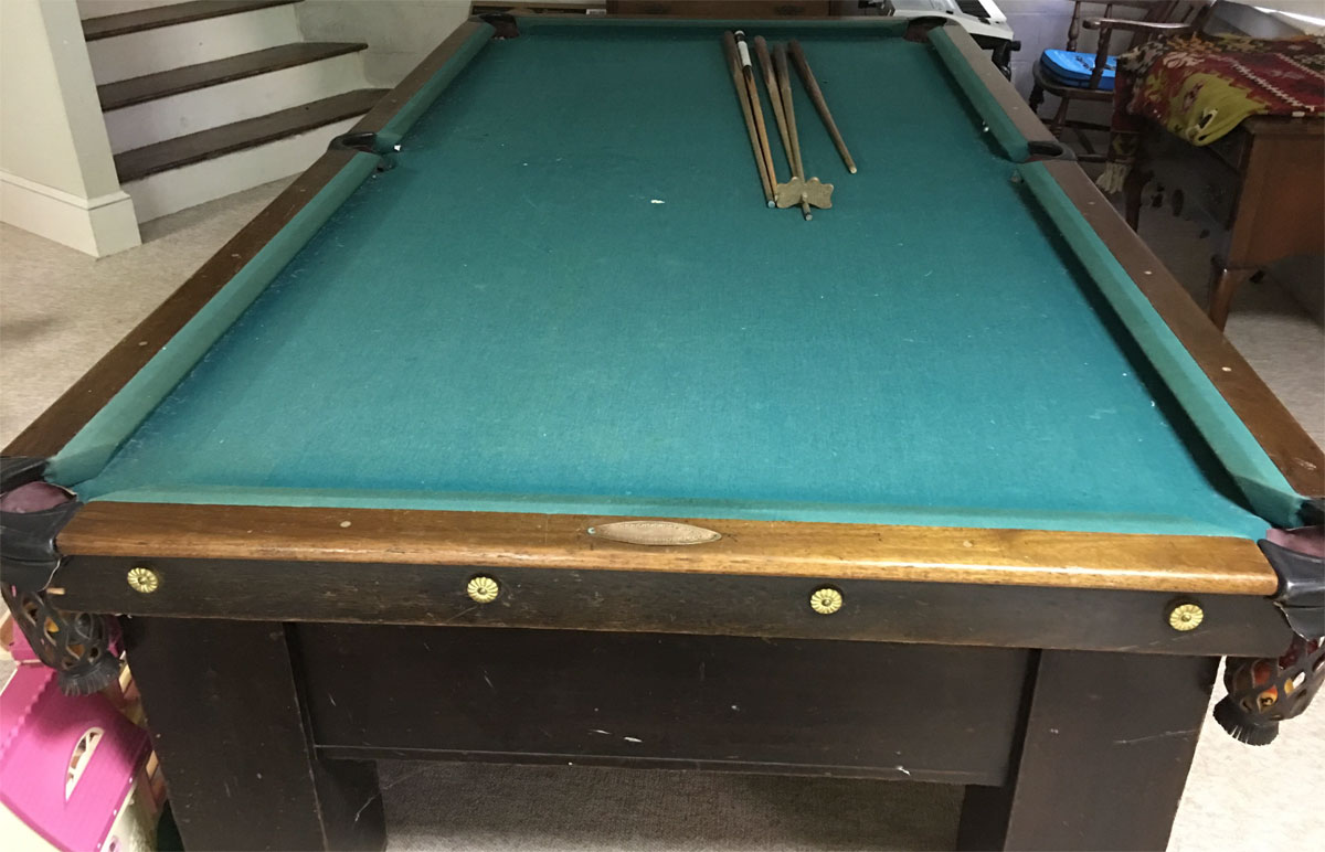 an Antique H. Wagner and Adler Pool Table